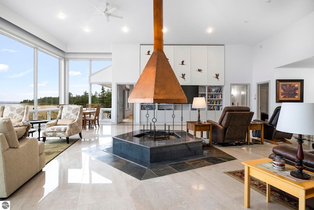 5343 Michibay Dr, Manistique, MI 49854 - living room with a high ceiling and a ceiling fan