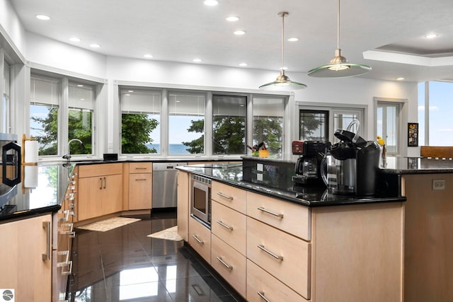 5343 Michibay Dr, Manistique, MI 49854 - kitchen featuring light brown cabinets, a sink, a wealth of natural light, and appliances with stainless steel finishes