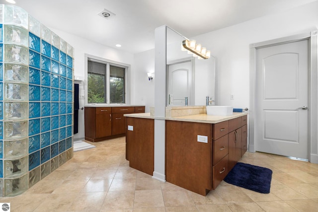 5343 Michibay Dr, Manistique, MI 49854 - bathroom featuring vanity, tile patterned floors, and recessed lighting