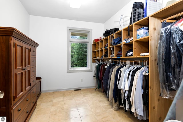 5343 Michibay Dr, Manistique, MI 49854 - spacious closet featuring visible vents and light tile patterned flooring