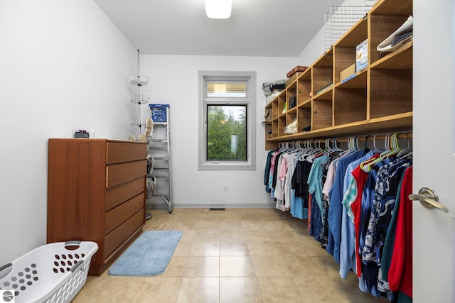 5343 Michibay Dr, Manistique, MI 49854 - walk in closet with light tile patterned floors