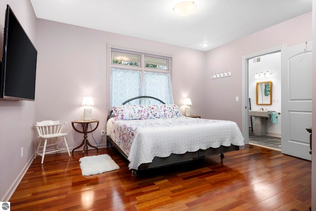 5343 Michibay Dr, Manistique, MI 49854 - bedroom with baseboards and wood finished floors