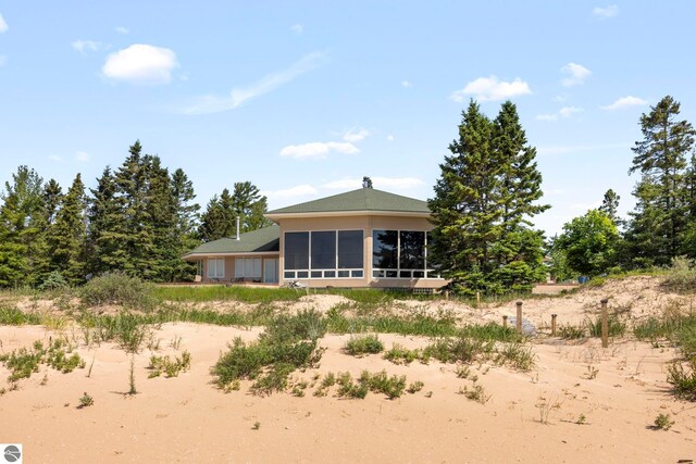 5343 Michibay Dr, Manistique, MI 49854 - back of property with a sunroom