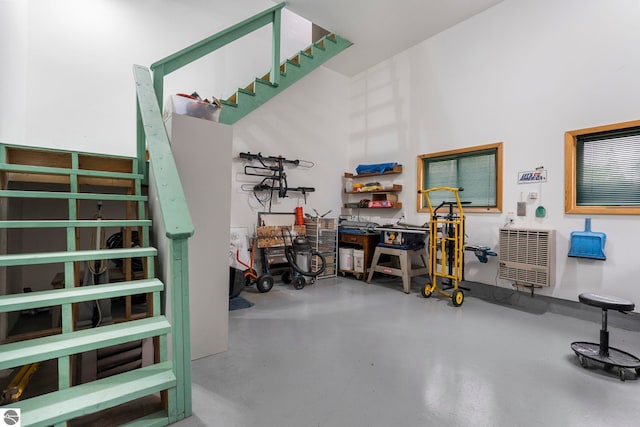 5343 Michibay Dr, Manistique, MI 49854 - stairway with concrete floors and a workshop area