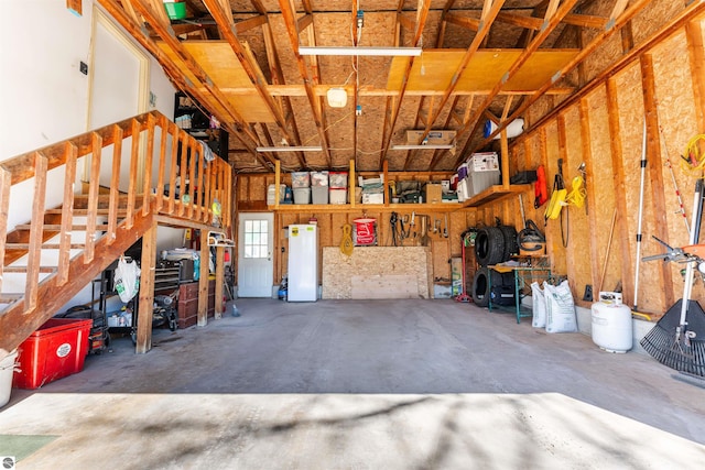 1294 Fisher Rd, Traverse City, MI 49685 - garage featuring fridge