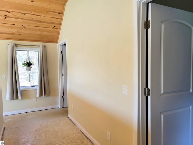 734 N Rolland Rd, Lake Isabella, MI 48893 - hallway featuring wooden ceiling, lofted ceiling, and carpet flooring