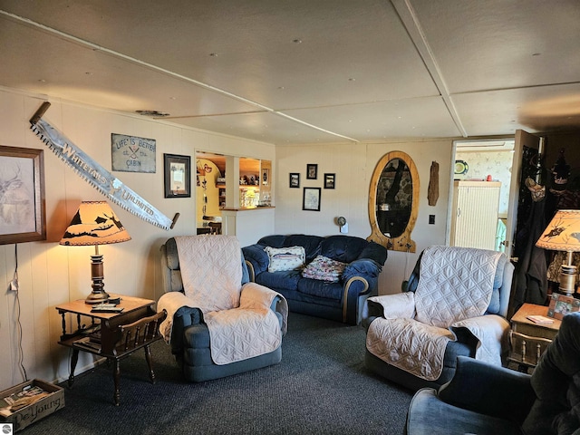 living area featuring carpet flooring