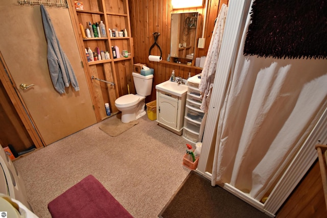 8991 W Oak Ln, Lake City, MI 49651 - full bathroom featuring carpet, toilet, wooden walls, and a shower