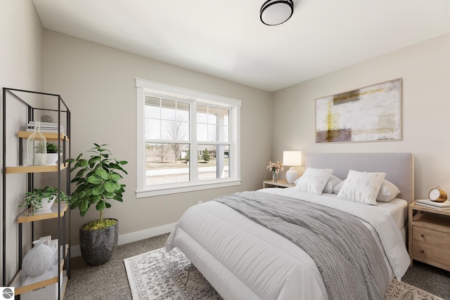 bedroom featuring carpet floors and baseboards