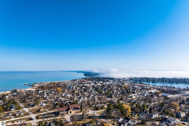 bird's eye view featuring a residential view and a water view