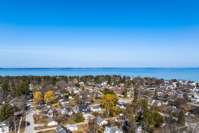 birds eye view of property featuring a residential view and a water view