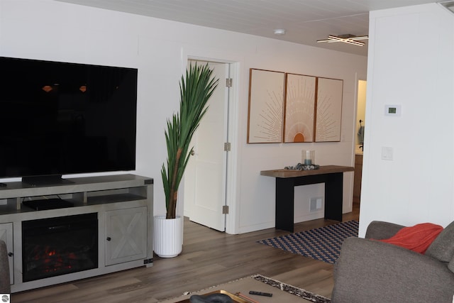 745 S Crescent Ave, Au Gres, MI 48703 - living room with wood finished floors and visible vents