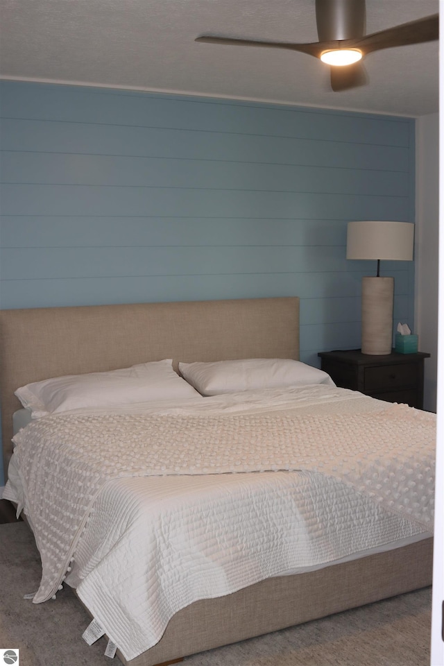 745 S Crescent Ave, Au Gres, MI 48703 - carpeted bedroom with a ceiling fan
