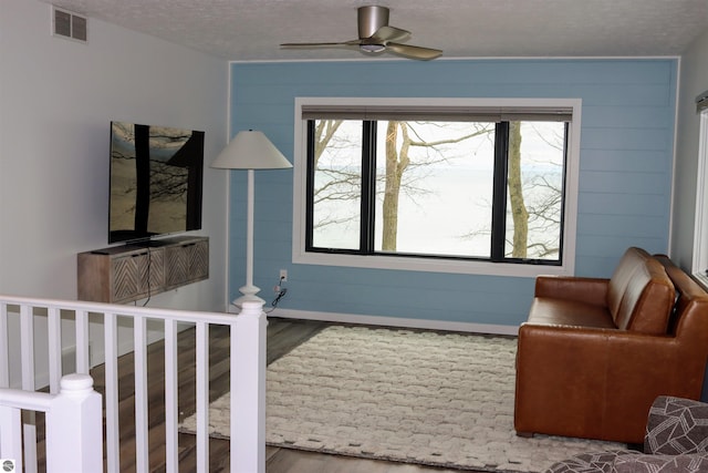 745 S Crescent Ave, Au Gres, MI 48703 - bedroom with visible vents, multiple windows, and wood finished floors