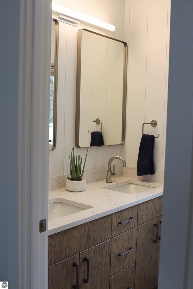 745 S Crescent Ave, Au Gres, MI 48703 - bathroom featuring a sink and double vanity