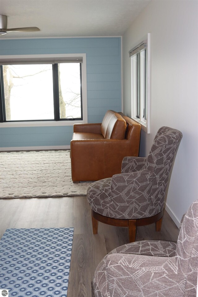 745 S Crescent Ave, Au Gres, MI 48703 - living area with a ceiling fan and wood finished floors