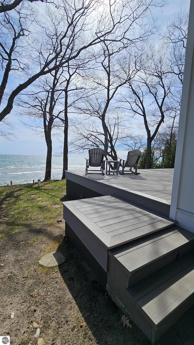 745 S Crescent Ave, Au Gres, MI 48703 - wooden terrace with a water view