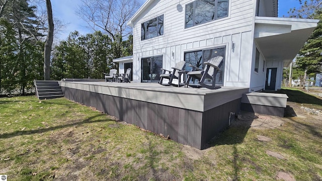 745 S Crescent Ave, Au Gres, MI 48703 - rear view of house featuring a yard and a wooden deck