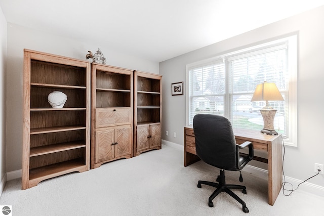 office area with baseboards and light colored carpet