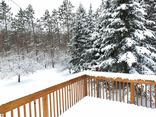 view of snow covered deck
