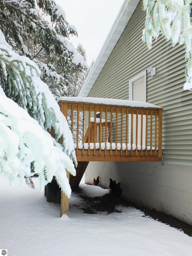 view of snow covered deck