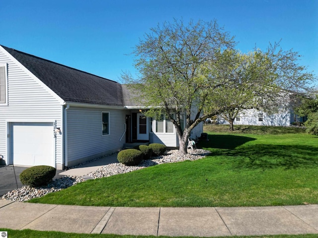 1173 Sunview, Saint Johns, MI 48879 - ranch-style home with an attached garage, roof with shingles, and a front yard