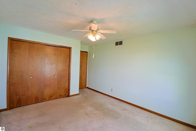 1173 Sunview, Saint Johns, MI 48879 - unfurnished bedroom featuring ceiling fan, baseboards, visible vents, and light carpet