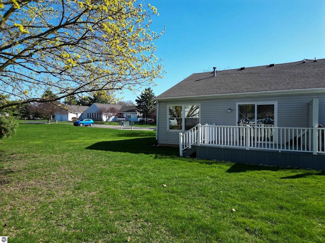 1173 Sunview, Saint Johns, MI 48879 - view of yard with a deck