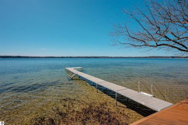 view of dock with a water view