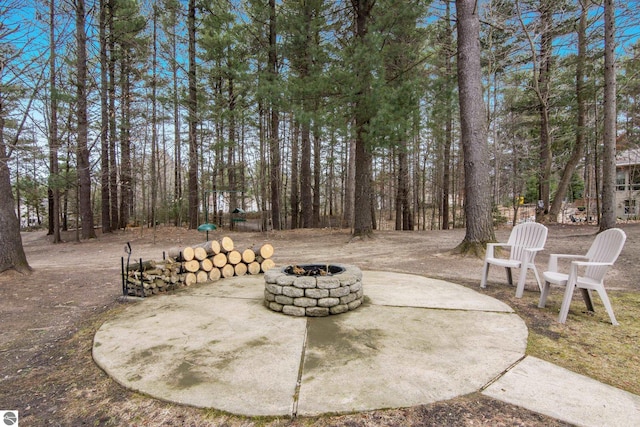 view of patio featuring a fire pit