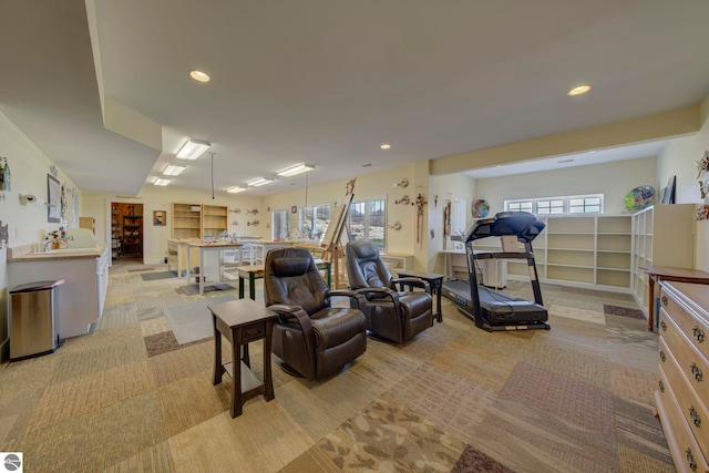 living room with light carpet, recessed lighting, and a healthy amount of sunlight