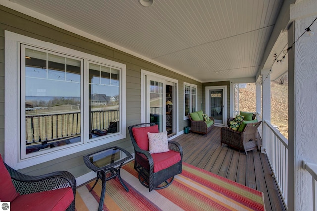 deck featuring covered porch