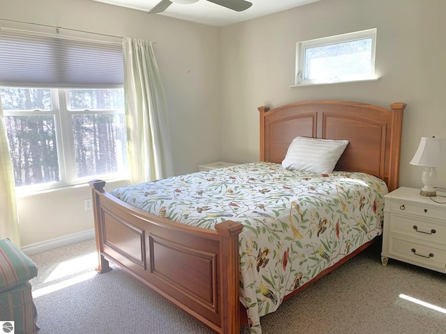 2708 Ruby St, Traverse City, MI 49684 - bedroom featuring light carpet, ceiling fan, and baseboards