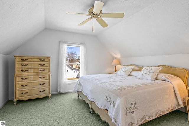 bedroom with baseboards, lofted ceiling, a ceiling fan, and light carpet