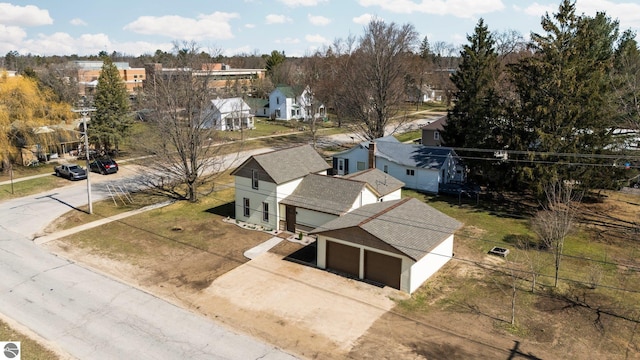 419 S Cherry St, Kalkaska, MI 49646 - drone / aerial view with a residential view