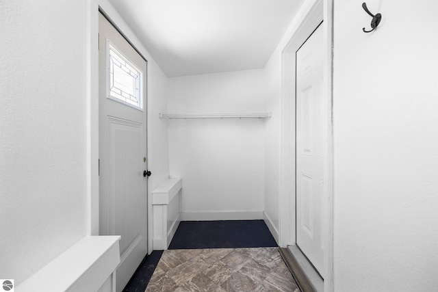 419 S Cherry St, Kalkaska, MI 49646 - interior space with stone finish floor