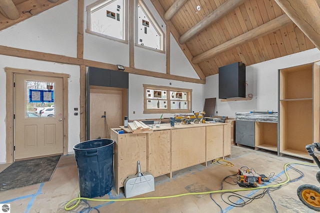 2609 Big Sky Rd, Kingsley, MI 49649 - kitchen with wooden ceiling, light brown cabinetry, beamed ceiling, and high vaulted ceiling