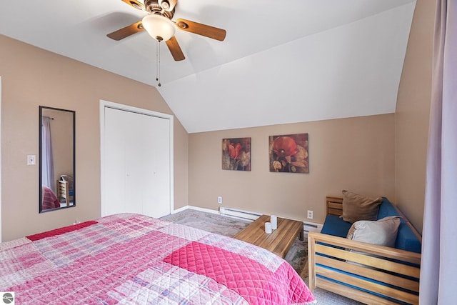 bedroom featuring baseboards, a ceiling fan, and vaulted ceiling