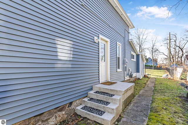 view of side of property with fence