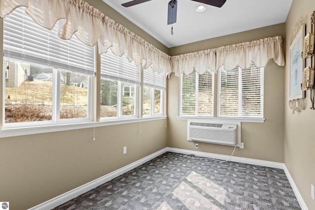 4584 Kodiak Dr, Traverse City, MI 49685 - unfurnished sunroom with a wall mounted AC and a healthy amount of sunlight