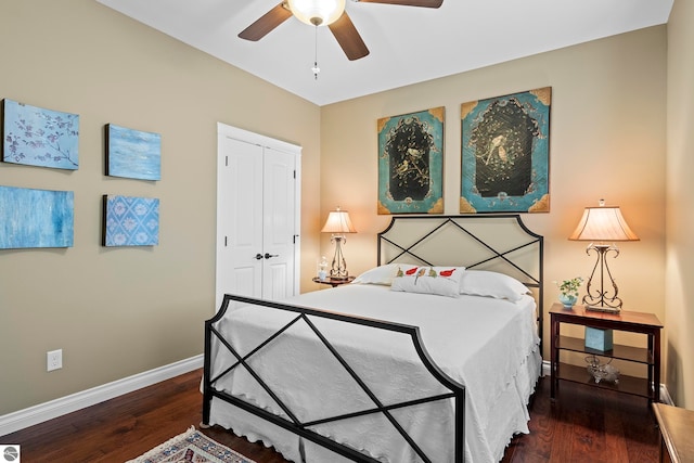4584 Kodiak Dr, Traverse City, MI 49685 - bedroom featuring wood finished floors, a closet, a ceiling fan, and baseboards