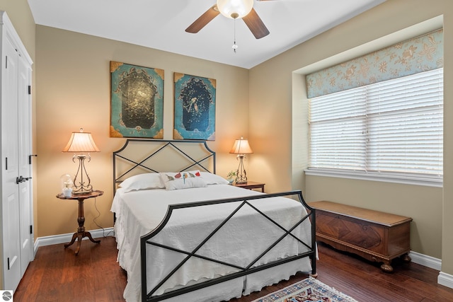 4584 Kodiak Dr, Traverse City, MI 49685 - bedroom featuring ceiling fan, baseboards, and wood finished floors