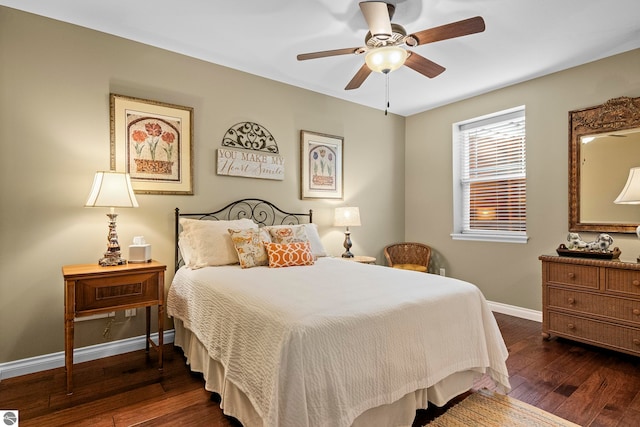 4584 Kodiak Dr, Traverse City, MI 49685 - bedroom featuring hardwood / wood-style flooring, baseboards, and a ceiling fan