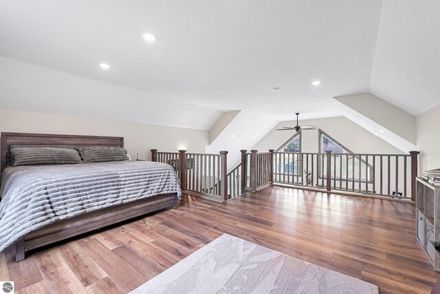 5891 Voice Rd, Kingsley, MI 49649 - bedroom featuring vaulted ceiling, wood finished floors, and recessed lighting