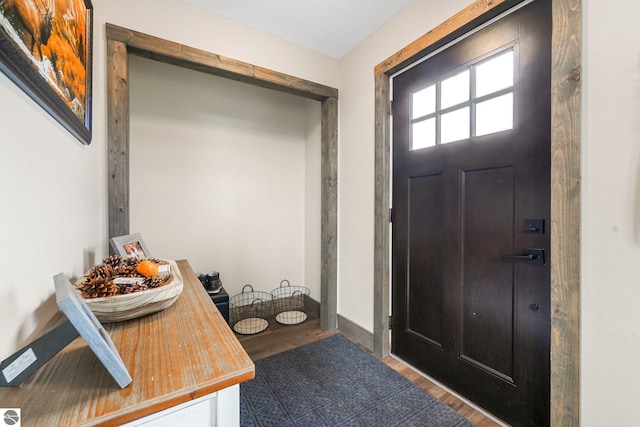 5891 Voice Rd, Kingsley, MI 49649 - entryway featuring wood finished floors and baseboards