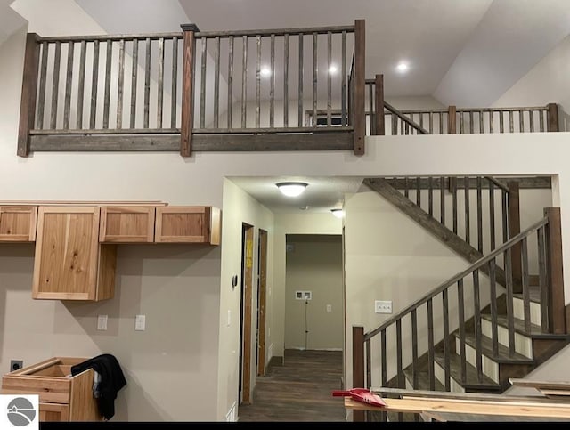 5891 Voice Rd, Kingsley, MI 49649 - staircase featuring wood finished floors
