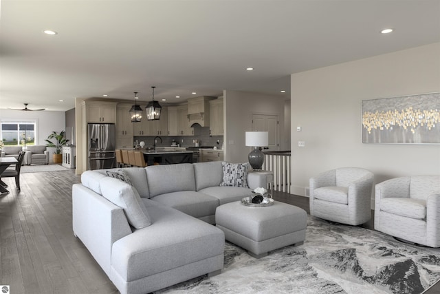 203 Vineyard Ridge Dr Unit 38, Traverse City, MI 49686 - living area with ceiling fan with notable chandelier, recessed lighting, and light wood-style floors
