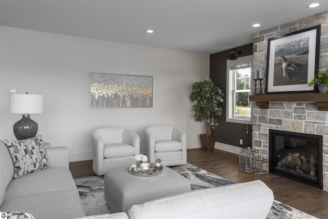 203 Vineyard Ridge Dr Unit 38, Traverse City, MI 49686 - living room with wood finished floors, baseboards, a fireplace, and recessed lighting