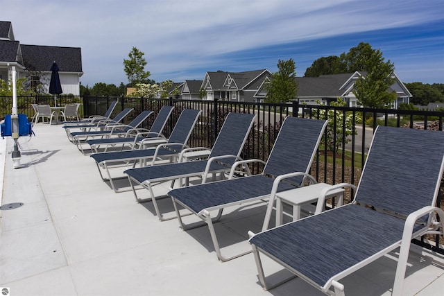 203 Vineyard Ridge Dr Unit 38, Traverse City, MI 49686 - view of patio / terrace with a residential view