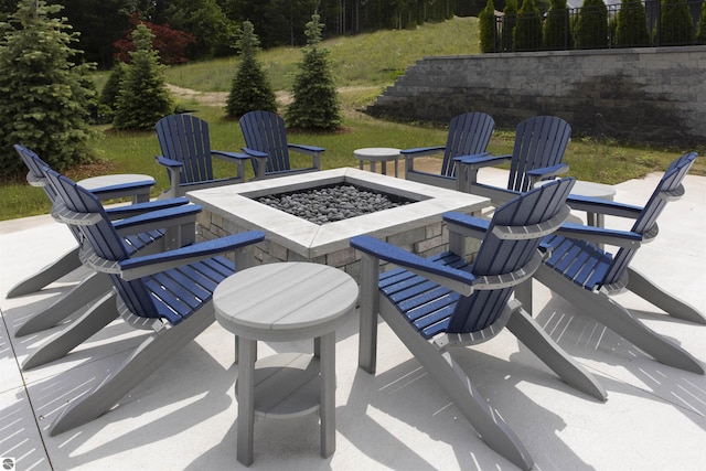203 Vineyard Ridge Dr Unit 38, Traverse City, MI 49686 - view of patio with a fire pit